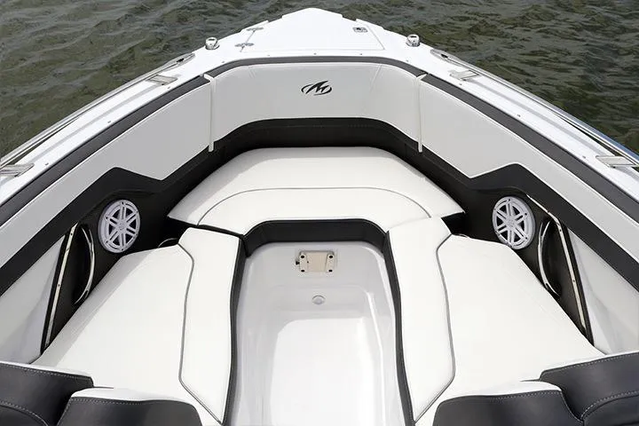 Slide: The Image of Manufacturer Provided Image: 2025 Monterey 255SS Super Sport boat interior with white seating and speakers. - 2