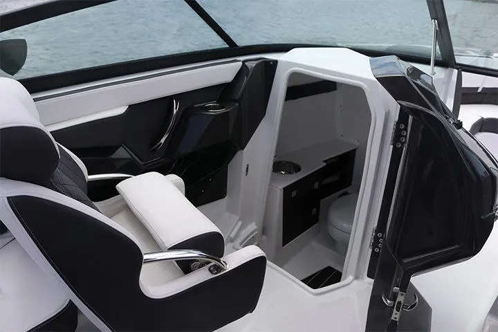 Slide: The Image of Manufacturer Provided Image: 2025 Monterey 255SS Super Sport boat interior with seating and compact cabin. - 8