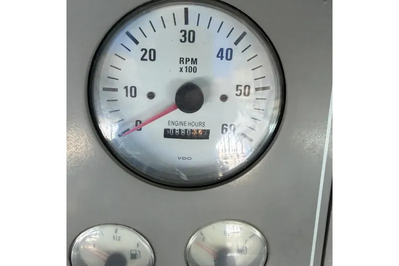Slide: The Image of RPM gauge of a 1998 Formula 34 Performance Cruiser showing engine hours. - 19