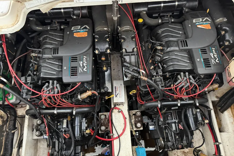 Slide: The Image of Twin MerCruiser V8 engines in a 1998 Formula 34 Performance Cruiser. - 36