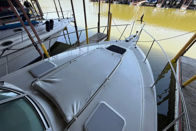 Slide: The Image of 1998 Formula 34 Performance Cruiser docked at marina, top view. - 6