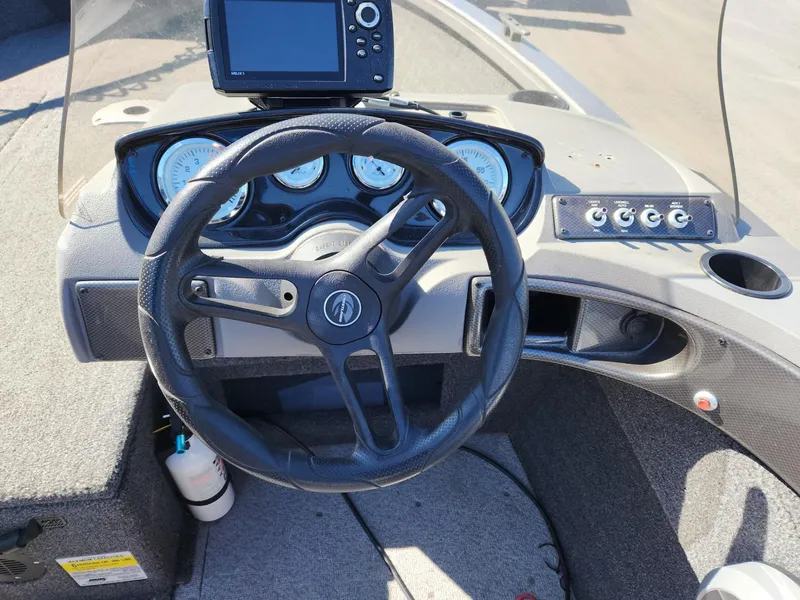 Slide: The Image of Steering wheel and dashboard of a 2020 Crestliner 1650 Fish Hawk SE SC. - 13