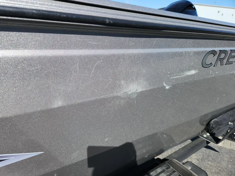 Slide: The Image of Close-up of a 2020 Crestliner 1650 Fish Hawk SE SC boat with scratches. - 27