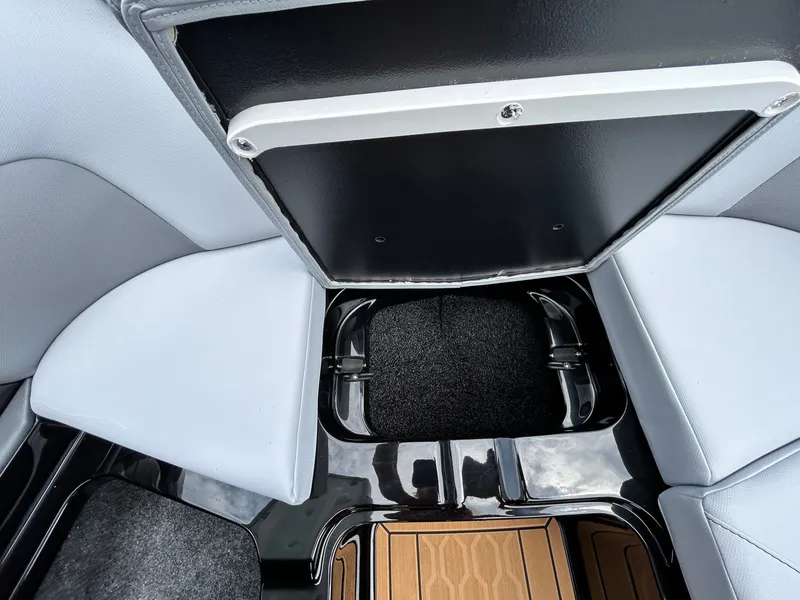 Slide: The Image of Interior of 2026 MasterCraft XT22 with storage and seating. - 17