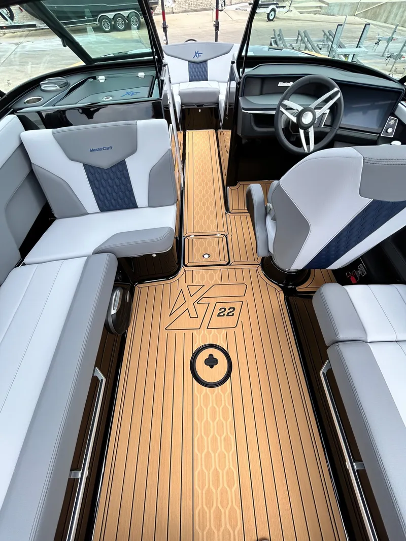Slide: The Image of Interior of 2026 MasterCraft XT22 boat with stylish design. - 23