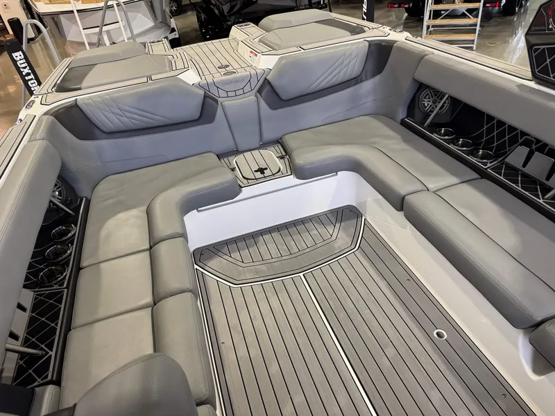 Slide: The Image of Interior of 2022 Nautique Super Air Nautique GS24 with gray seating. - 16