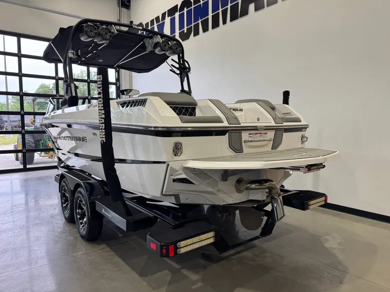 Slide: The Image of 2022 Nautique Super Air Nautique GS24 boat in showroom. - 5