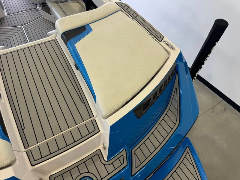 Slide: The Image of Rear view of a 2014 Nautique Super Air Nautique 230 boat. - 11
