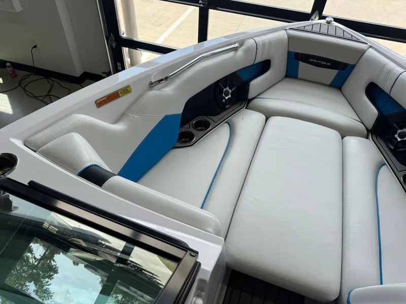 Slide: The Image of Interior of a 2014 Nautique Super Air Nautique 230 boat. - 19