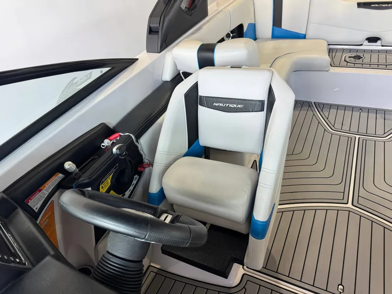 Slide: The Image of Interior of a 2014 Nautique Super Air Nautique 230 boat. - 20