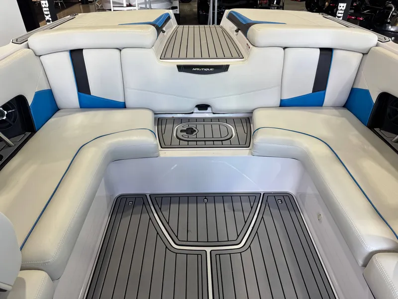 Slide: The Image of Interior of a 2014 Nautique Super Air Nautique 230 boat. - 26