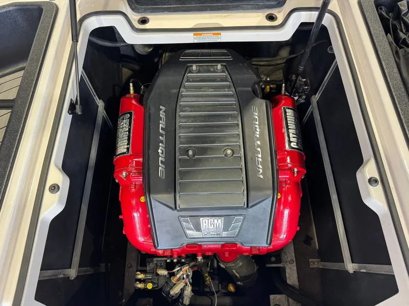 Slide: The Image of Engine of a 2014 Nautique Super Air Nautique 230 boat. - 27