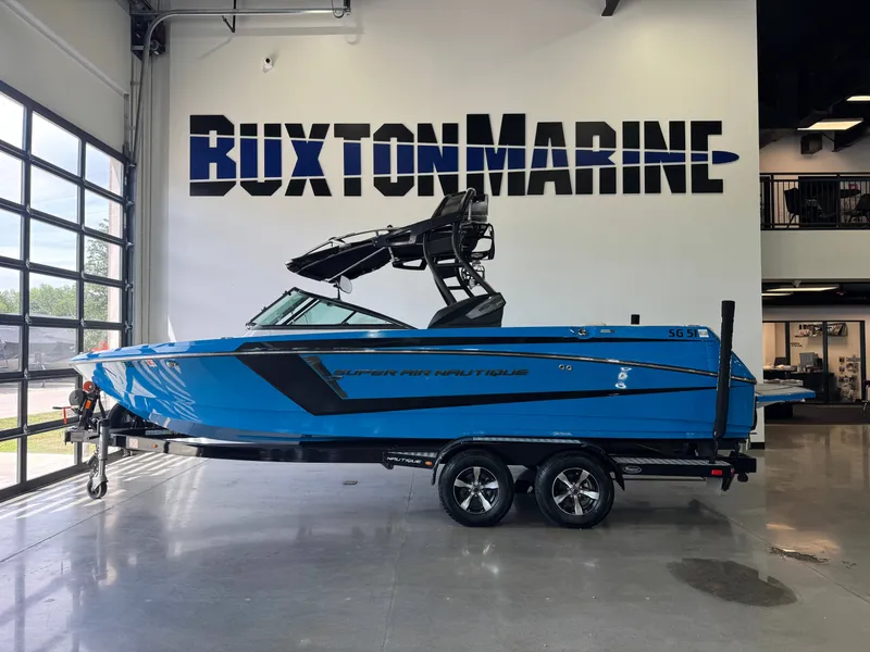 Slide: The Image of 2014 Nautique Super Air Nautique 230 boat at Buxton Marine. - 4