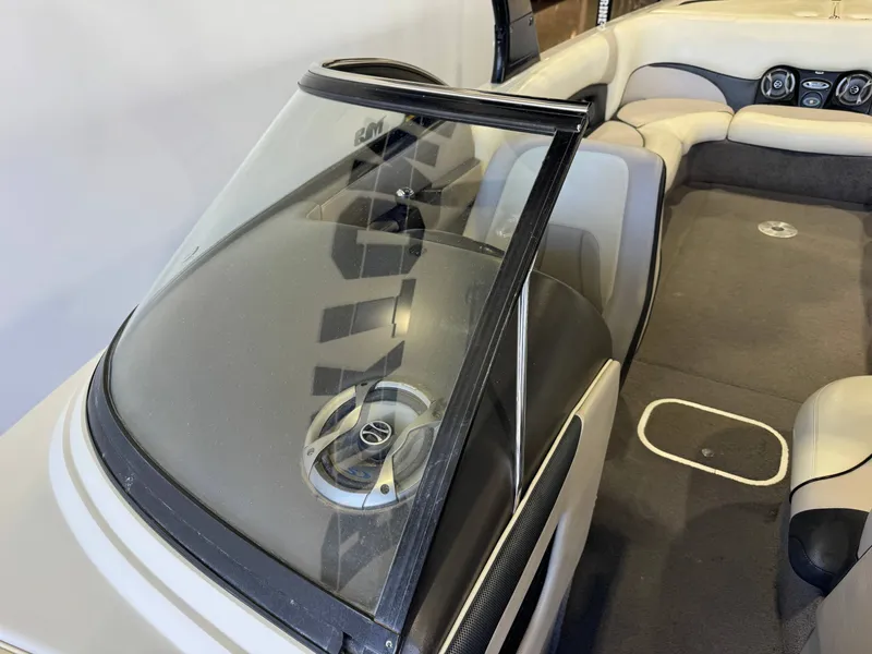 Slide: The Image of Interior of a 2006 Malibu 247 LSV boat with speaker. - 20