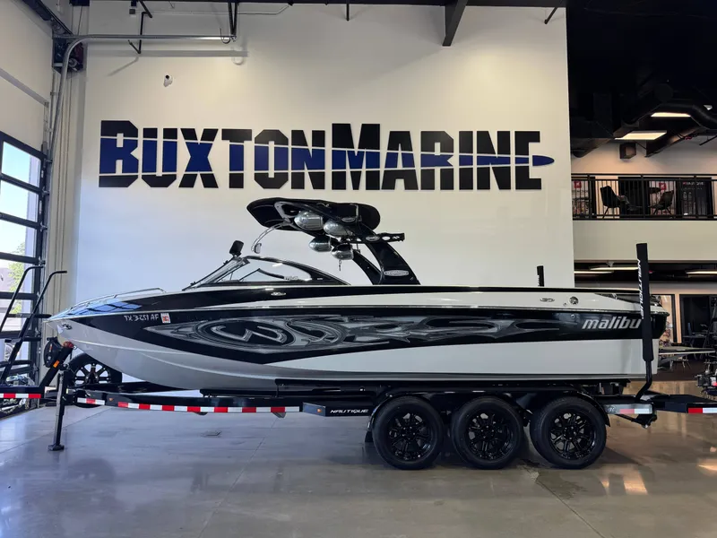 Slide: The Image of 2006 Malibu 247 LSV boat at Buxton Marine. - 4