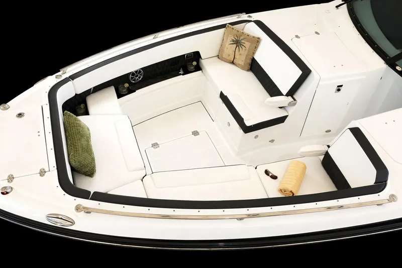 Slide: The Image of Manufacturer Provided Image: 2025 Monterey 385SS Super Sport boat interior with plush seating and decorative cushions. - 3