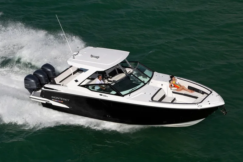 Slide: The Image of Manufacturer Provided Image: 2025 Monterey 385SS Super Sport cruising on open water, showcasing sleek design and powerful engines. - 9