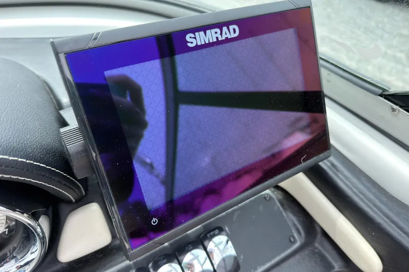 Slide: The Image of Simrad display on 2018 Crownline Eclipse E215 XS boat dashboard. - 13