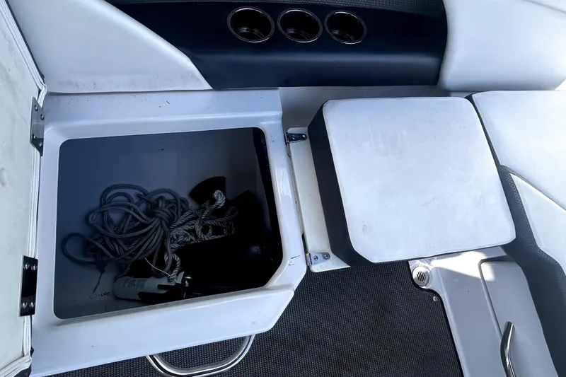 Slide: The Image of Storage compartment in 2017 Scarab 255 H.O. Impulse boat with ropes inside. - 19
