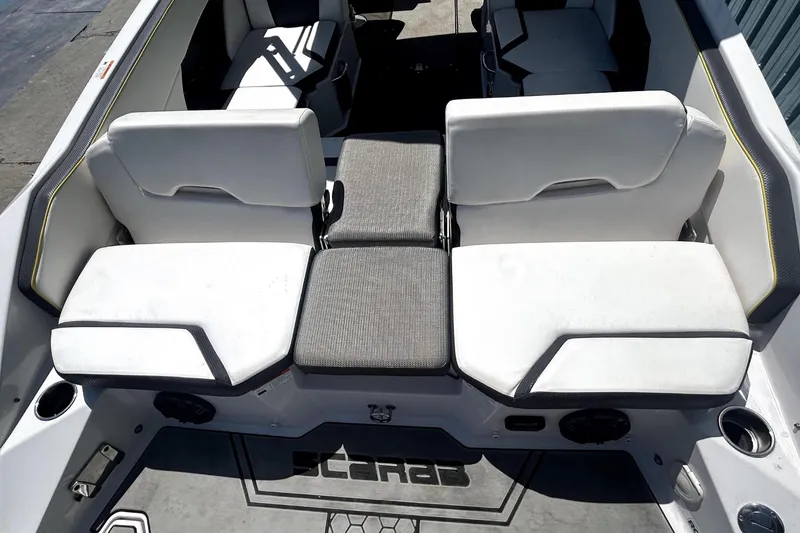 Slide: The Image of Interior of a 2017 Scarab 255 H.O. Impulse boat with white seating. - 6