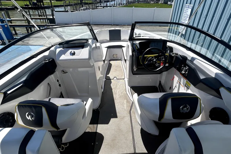 Slide: The Image of 2017 Scarab 255 H.O. Impulse boat interior with sleek seating and modern dashboard. - 8