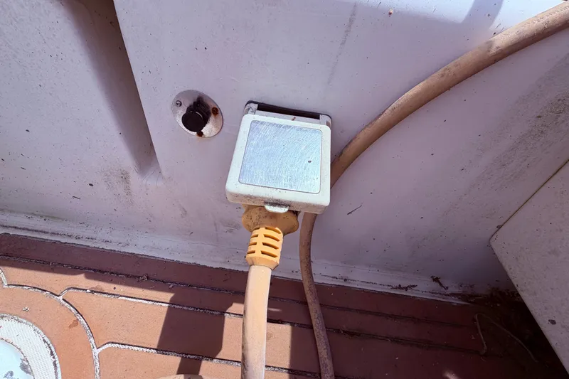 Slide: The Image of Power outlet with cable on 1981 CAL 31 boat deck. - 15
