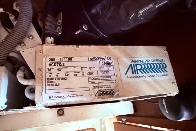 Slide: The Image of Marine air conditioning unit by Dometic Corporation, model VCD7K/2, installed in a 1981 CAL 31. - 36