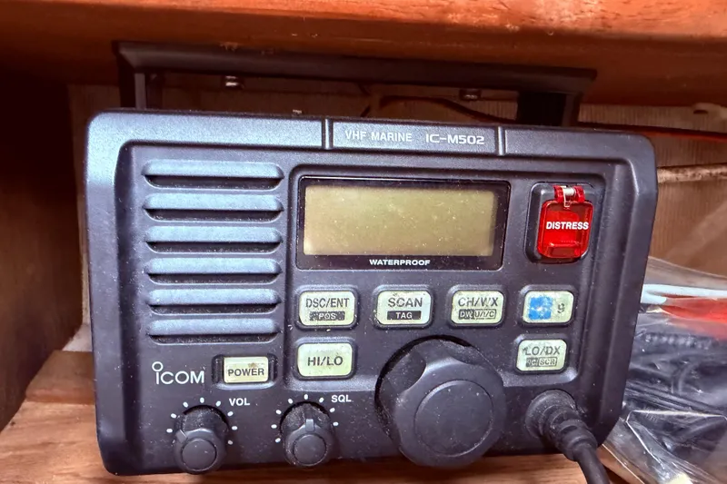 Slide: The Image of VHF marine radio IC-M502 on CAL 31, 1981 model, featuring distress button. - 45