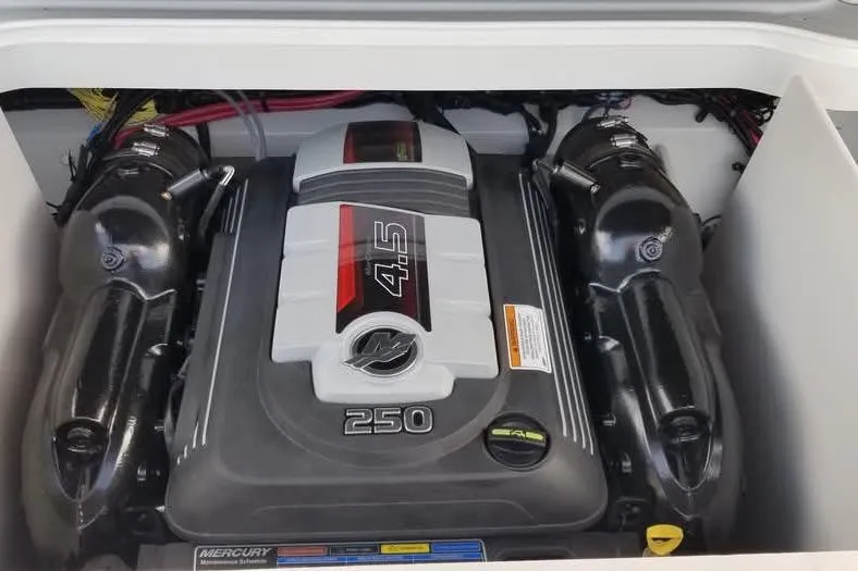 Slide: The Image of 2016 Crownline 225 SS boat engine, featuring a Mercury 4.5L 250 horsepower motor. - 8