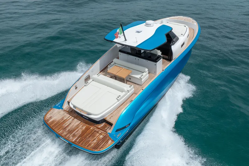 Slide: The Image of 2026 Solaris Power 44 Sport Turismo yacht cruising on open water, showcasing sleek design. - 10