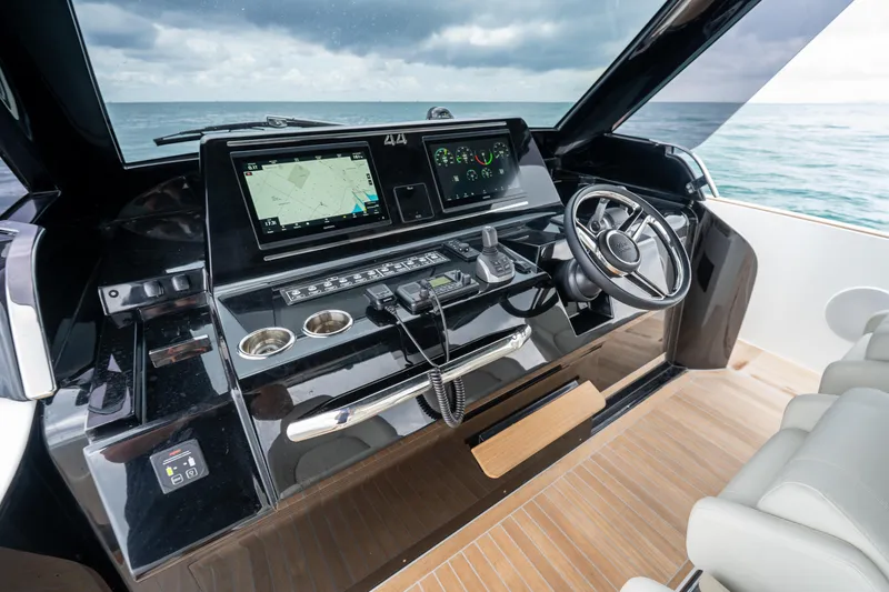 Slide: The Image of Helm of 2026 Solaris Power 44 Sport Turismo yacht with advanced navigation system. - 12