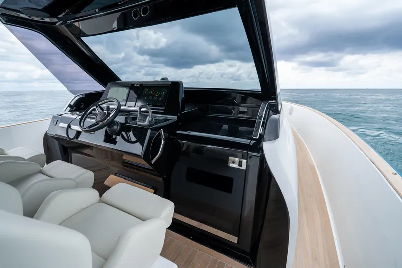 Slide: The Image of Helm of 2026 Solaris Power 44 Sport Turismo yacht with modern controls and ocean view. - 13