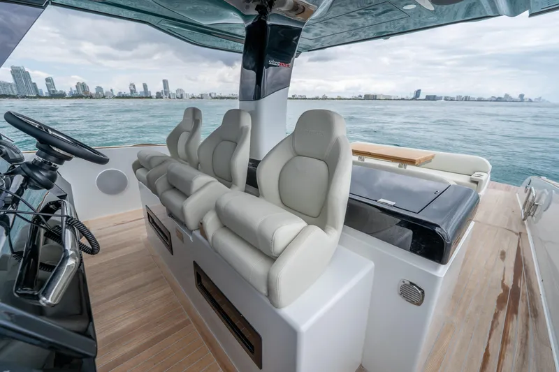 Slide: The Image of Luxury interior of 2026 Solaris Power 44 Sport Turismo yacht with city skyline view. - 18