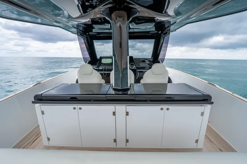 Slide: The Image of 2026 Solaris Power 44 Sport Turismo yacht interior with sleek design and ocean view. - 19