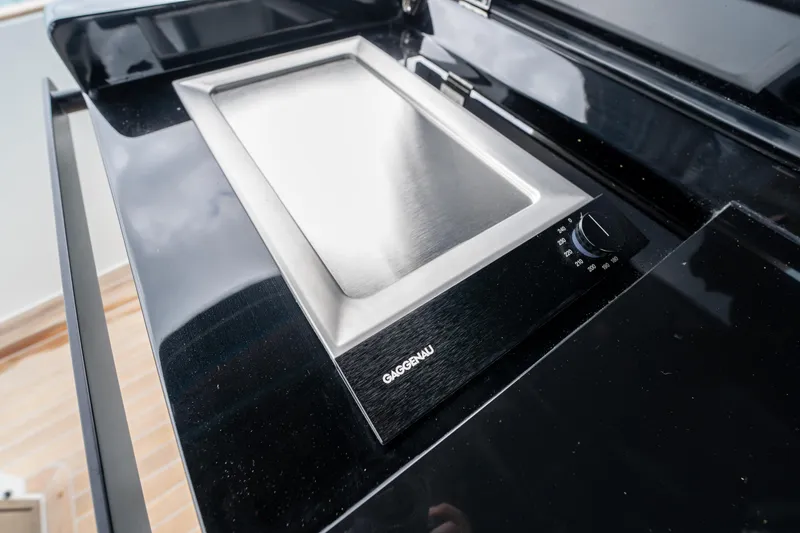 Slide: The Image of Gaggenau appliance on Solaris Power 44 Sport Turismo yacht, 2026 model, featuring sleek design. - 20