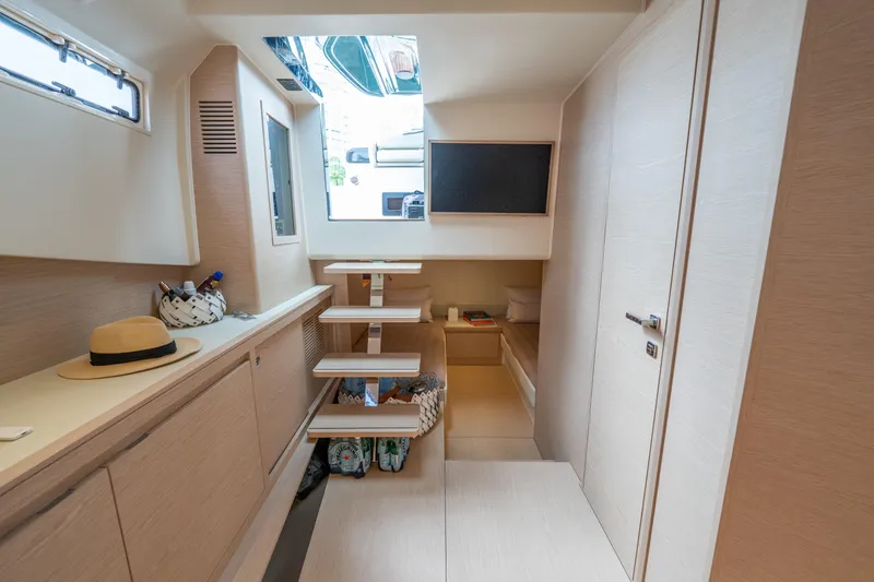 Slide: The Image of Interior of 2026 Solaris Power 44 Sport Turismo yacht, featuring modern design and wooden finishes. - 34