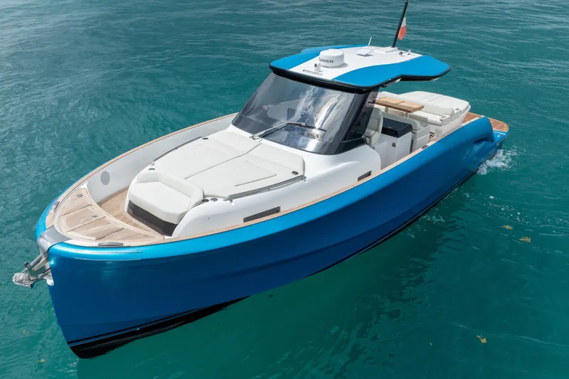 Slide: The Image of 2026 Solaris Power 44 Sport Turismo yacht cruising on clear blue water. - 40