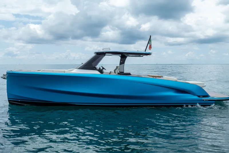 Slide: The Image of 2026 Solaris Power 44 Sport Turismo yacht on calm ocean under cloudy sky. - 5