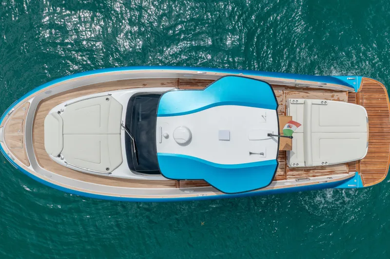 Slide: The Image of Overhead view of 2026 Solaris Power 44 Sport Turismo yacht on turquoise water. - 6