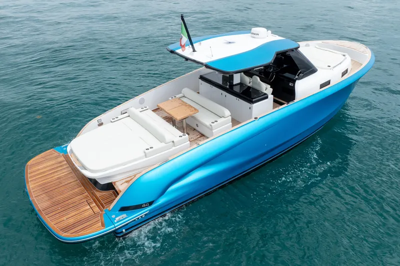 Slide: The Image of 2026 Solaris Power 44 Sport Turismo yacht on open water, featuring sleek design and spacious deck. - 8