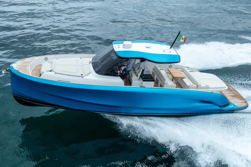 Slide: The Image of 2026 Solaris Power 44 Sport Turismo yacht cruising on open water, showcasing sleek design. - 9