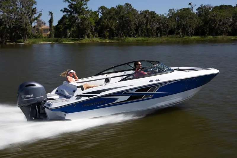 The Image of Manufacturer Provided Image: 2026 Monterey M-225 boat cruising on a calm lake with two passengers. - 0