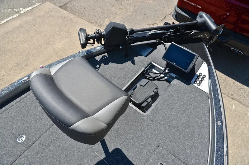 Slide: The Image of 2022 Caymas CX 20 boat deck with Garmin electronics and comfortable seating. - 24