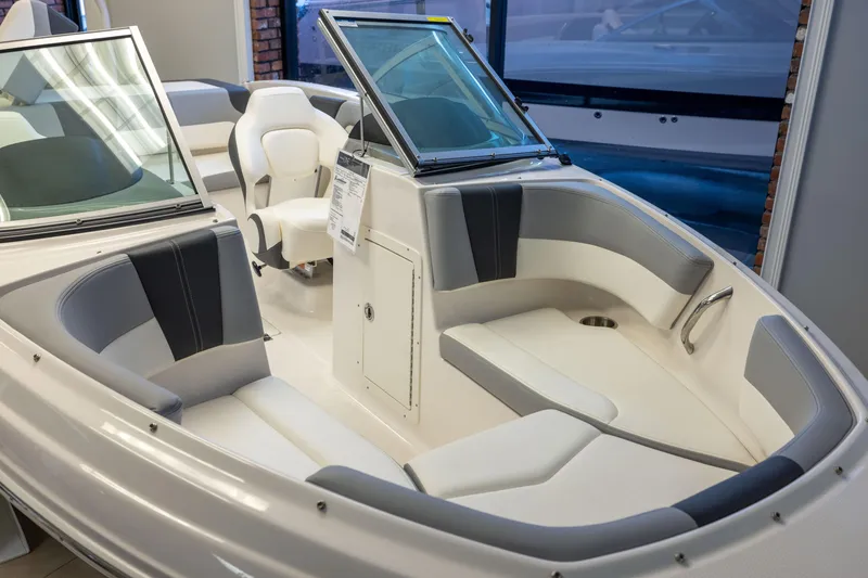 Slide: The Image of 2024 Chaparral 19 SSi OB boat interior with sleek seating and modern design. - 20