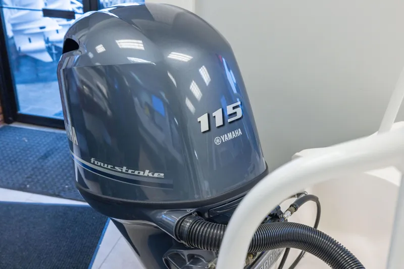 Slide: The Image of Yamaha 115 four-stroke outboard motor on 2024 Chaparral 19 SSi OB boat. - 4