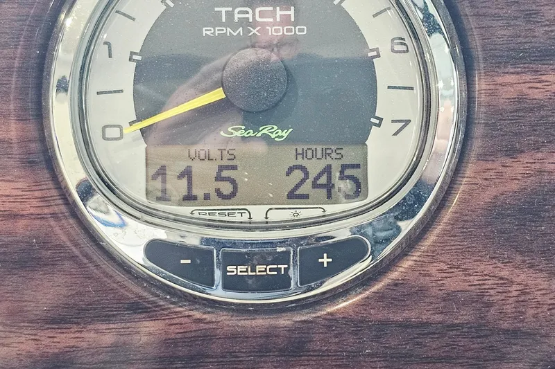Slide: The Image of Tachometer of 2012 Sea Ray 200 Sundeck showing 11.5 volts and 245 hours. - 24