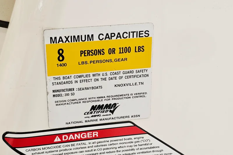 Slide: The Image of 2012 Sea Ray 200 Sundeck capacity label, maximum 8 persons or 1100 lbs. - 25