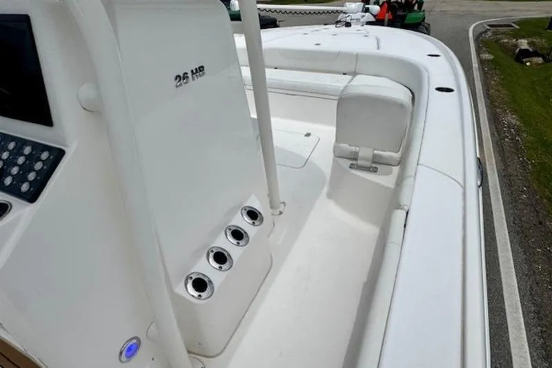 Slide: The Image of 2023 Caymas 26 HB boat interior with seating and control panel. - 16