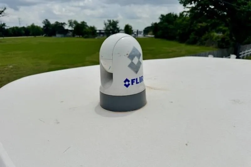 Slide: The Image of FLIR camera on 2023 Caymas 26 HB boat, outdoor setting. - 20