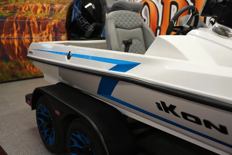 The Image of 2026 iKon VLE21 boat with sleek design, blue accents, and modern seating. - 0